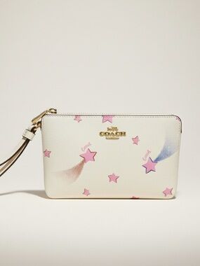 Coach Corner Zip Wristlet with Disco Star Print Coated Canvas. EUC